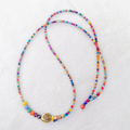 Colorful beaded necklace on a white background